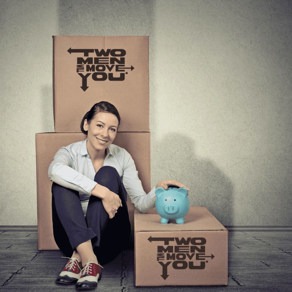 Moving boxes printed with the Two Men Will Move You logo beside a piggy bank